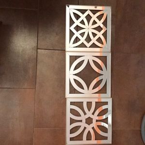 Three piece hanging silver wall art